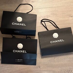 CHANEL Black Shopping Bags with White Logo